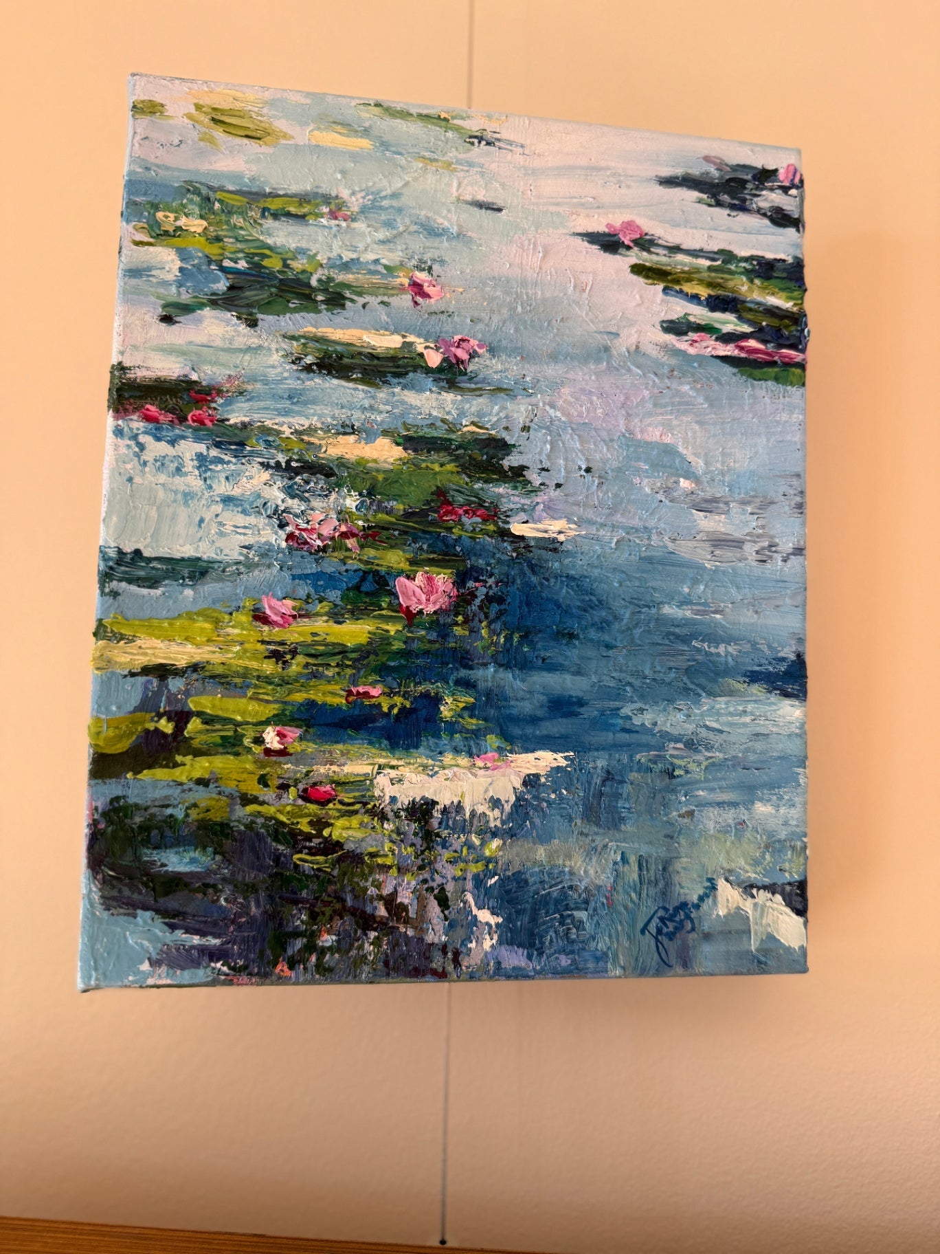 'Scattered on the Water' Various shades of blue, pink, green, and white
