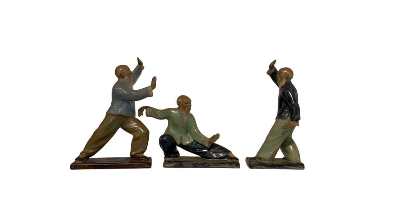 Trio of Chinese ceramic tai chi figurines