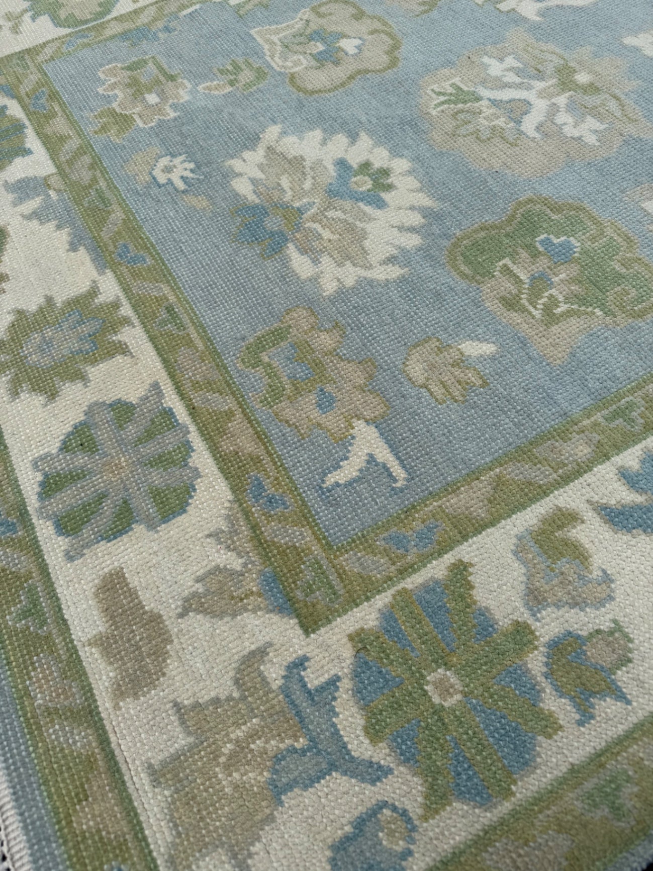 Oushak rug, 5’ x 7’, blue base, green, cream