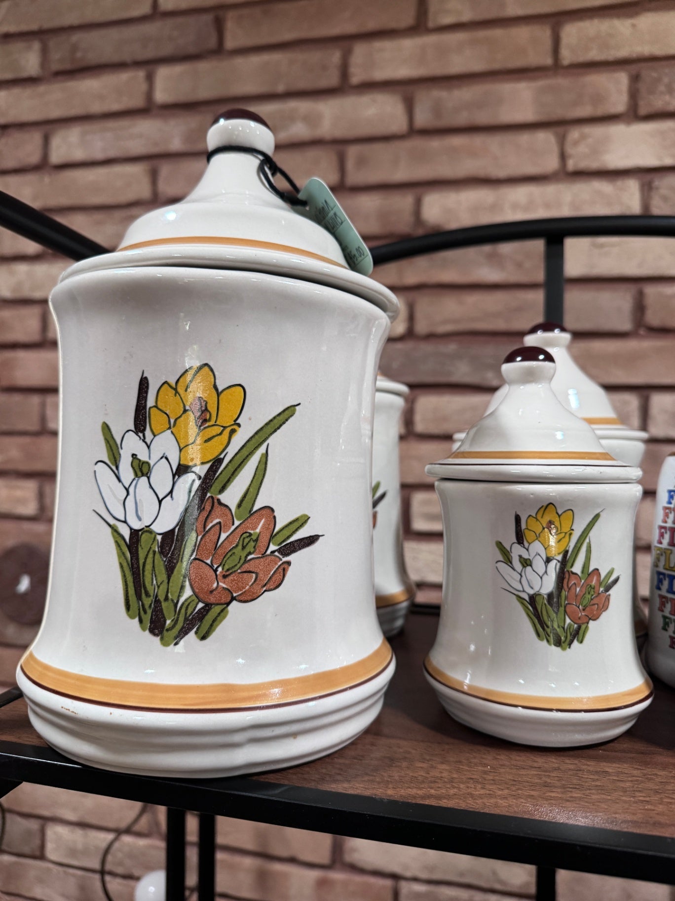 Set of 4 California Pottery Painted Lillies Canisters