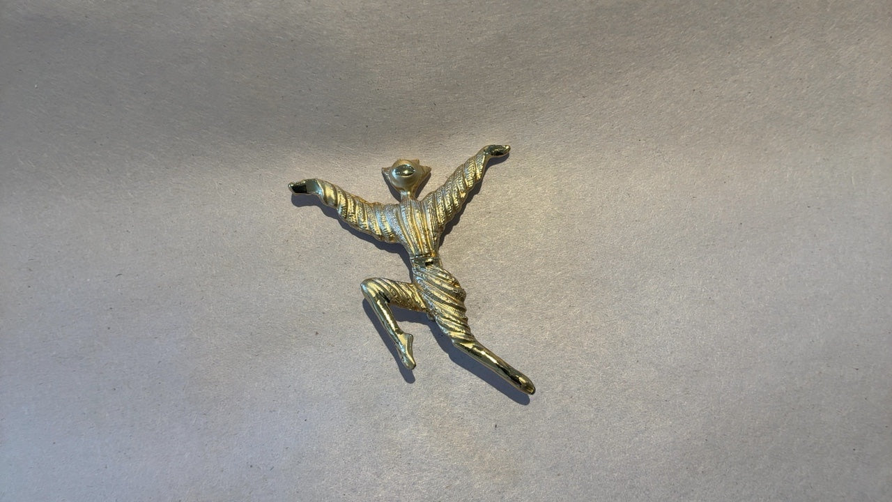 Gold Figure Broach