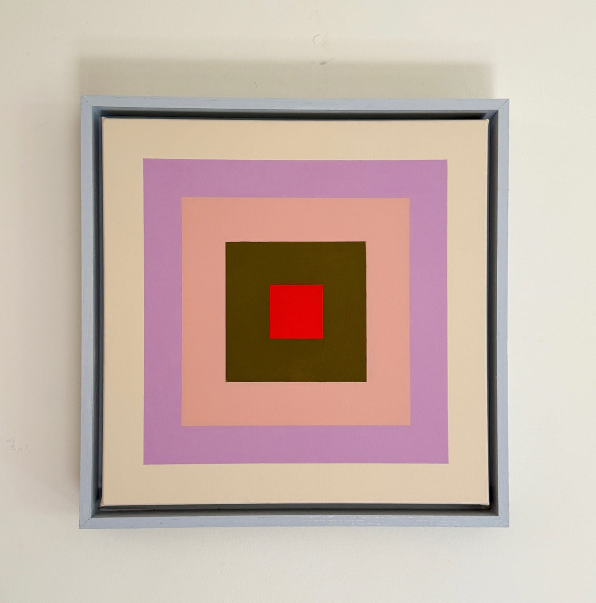 “Color Echo- Red ” by Rebecca Dodson, acrylic on canvas mounted in float frame, 16”x16”