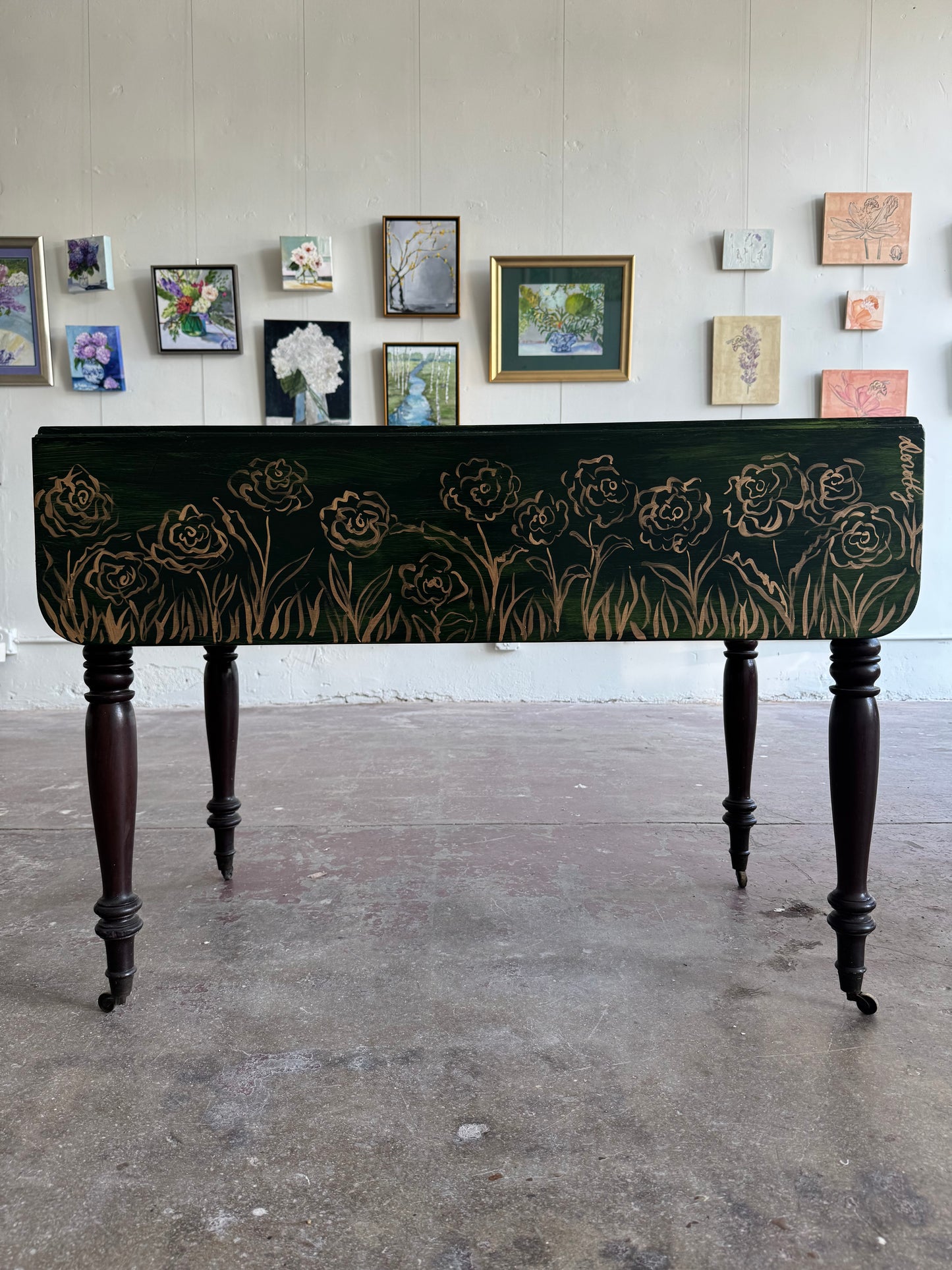 “Enchanted Meadow” by Dorothy Collier, mixed media on vintage drop leaf game table